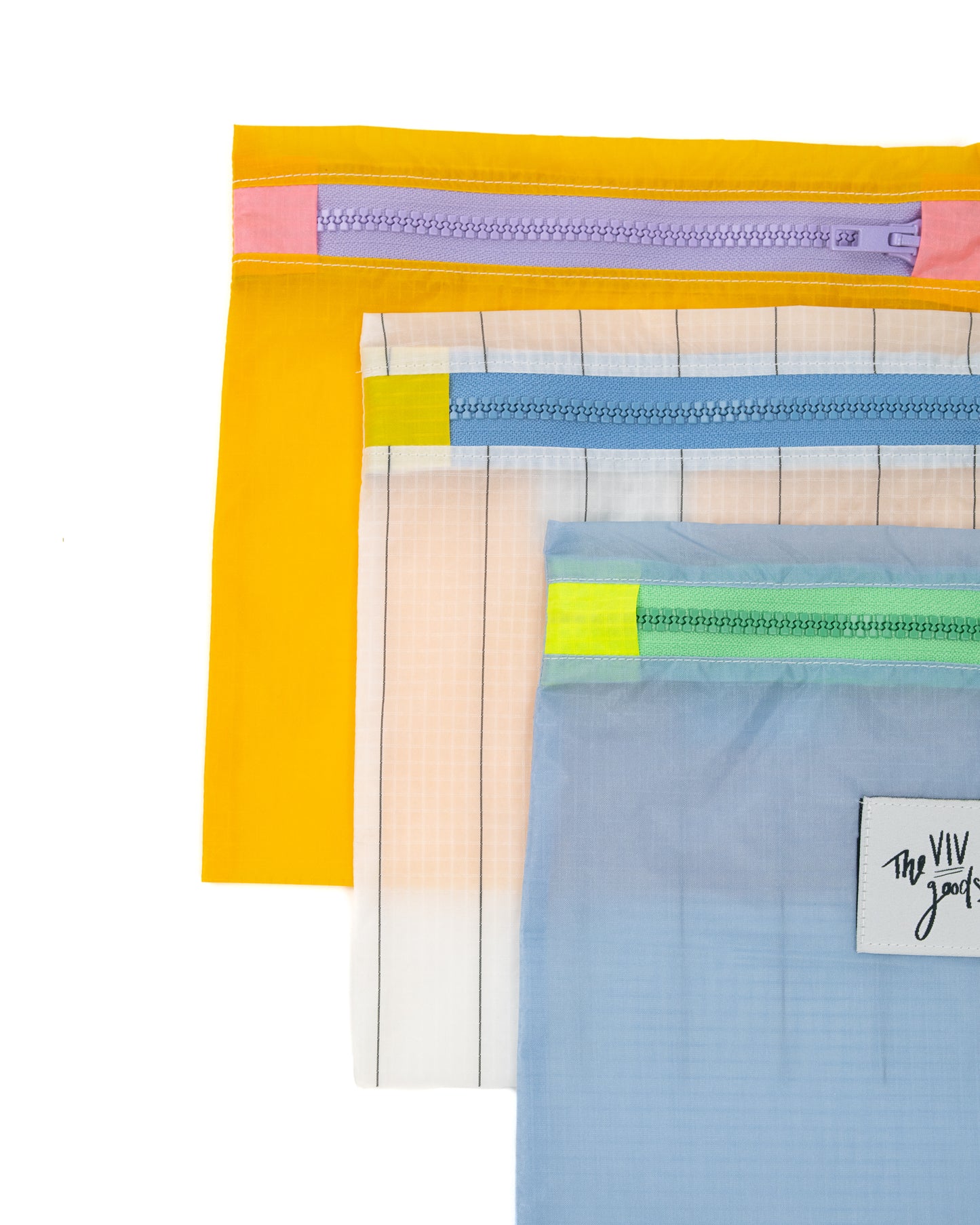 colored square zipper pouch with lavender zipper made from upcycled ripstop nylon