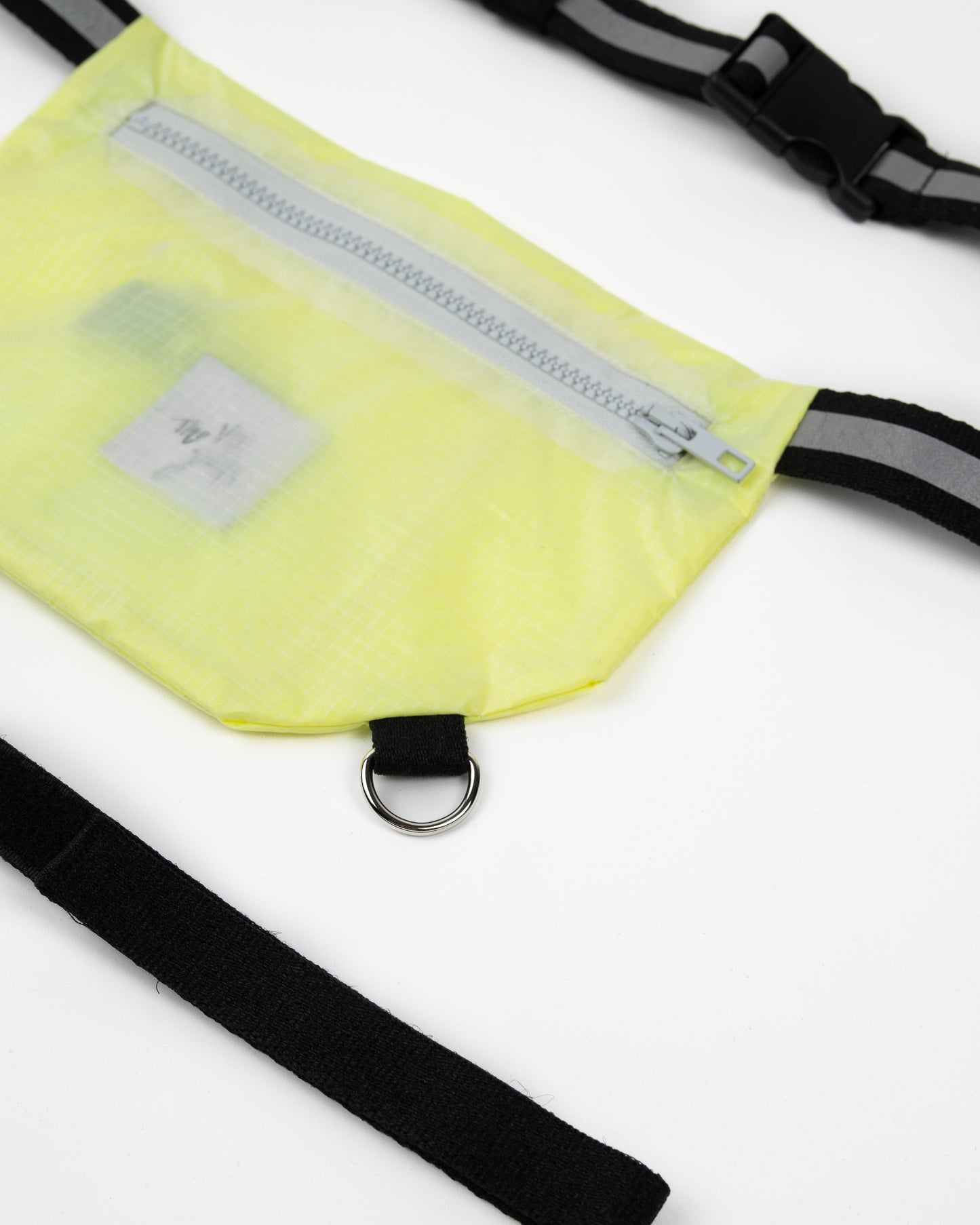 Running bag for athletes flat lay in neon yellow with black straps
