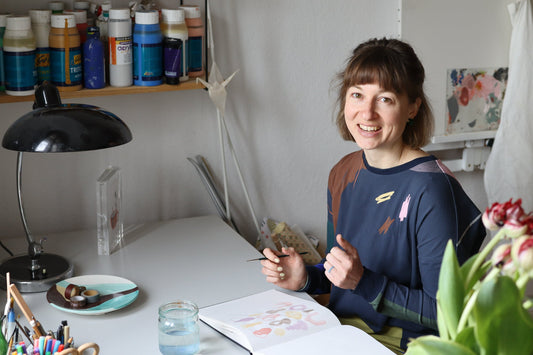 portrait of Denise Zimmer in her painting studio