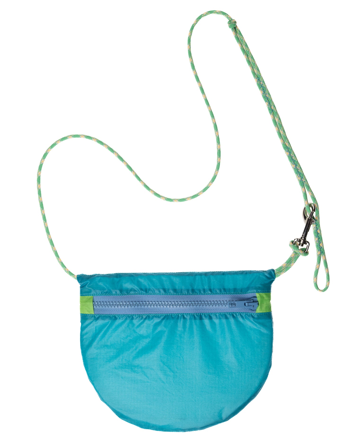 flat lay crossbody bag in turquoise and green made from recycled rip stop nylon