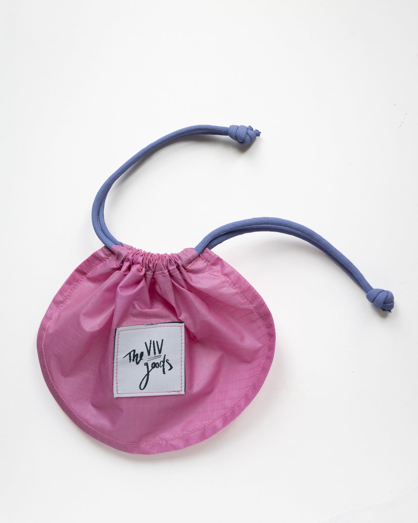set of two draw string pouches made from rip stop nylon in light and dark pink