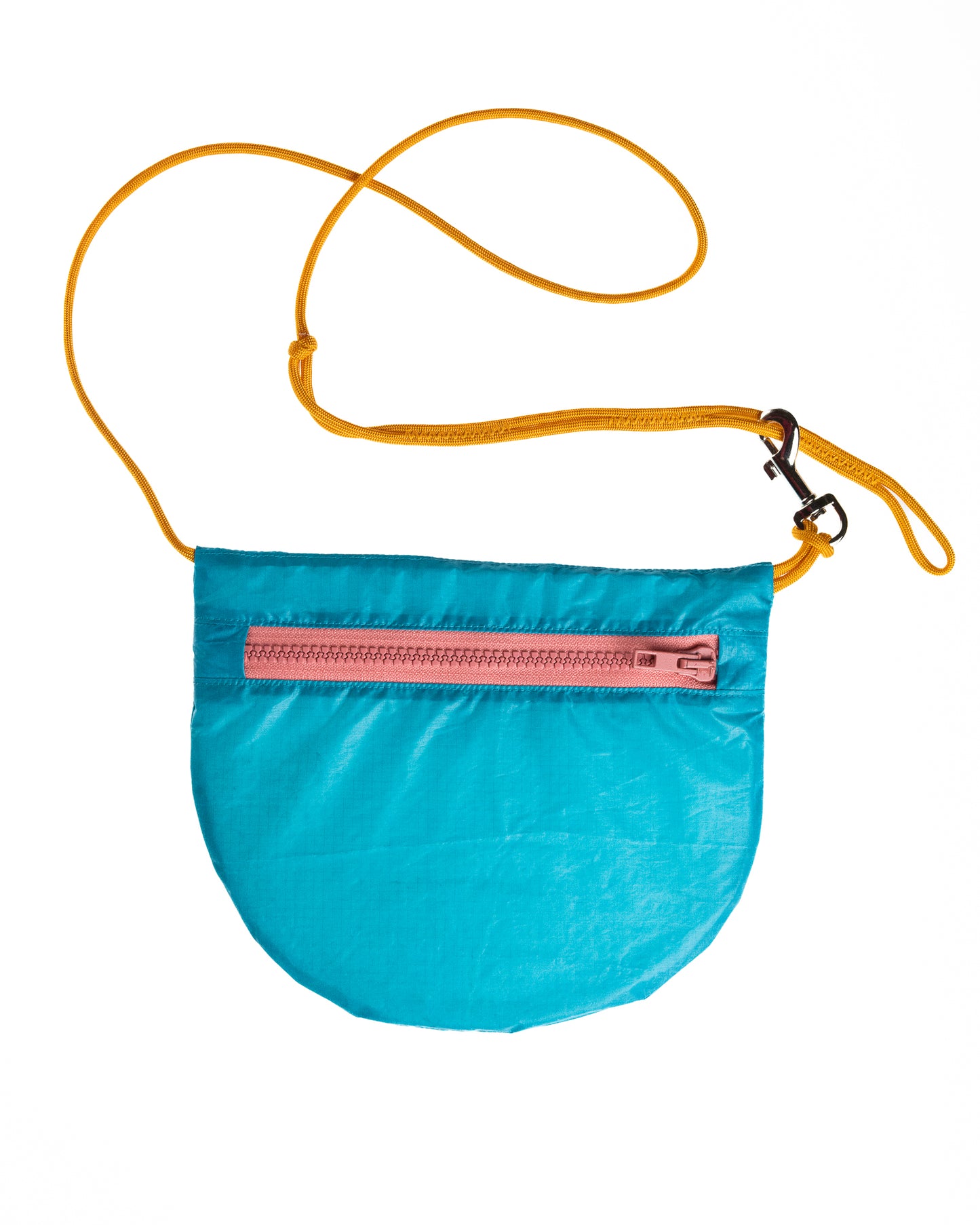 sling bag in turquoise with dusty rose zipper and orange rope strap made from recycled ripstop nylon