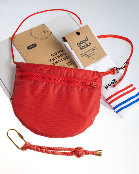 solid red U.BAG with good socks brand socks and red rope keychain