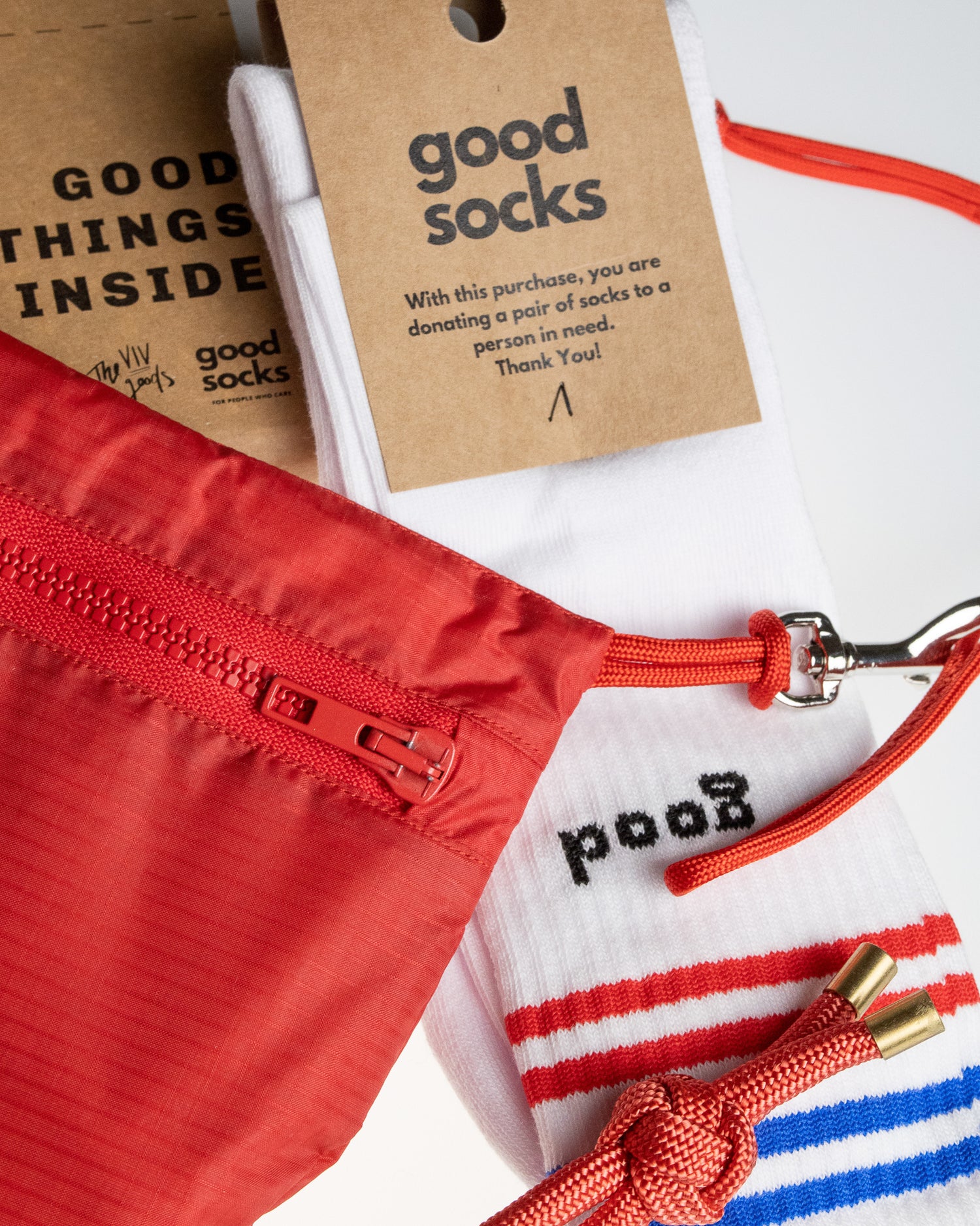 solid red U.BAG with good socks brand socks and red rope keychain