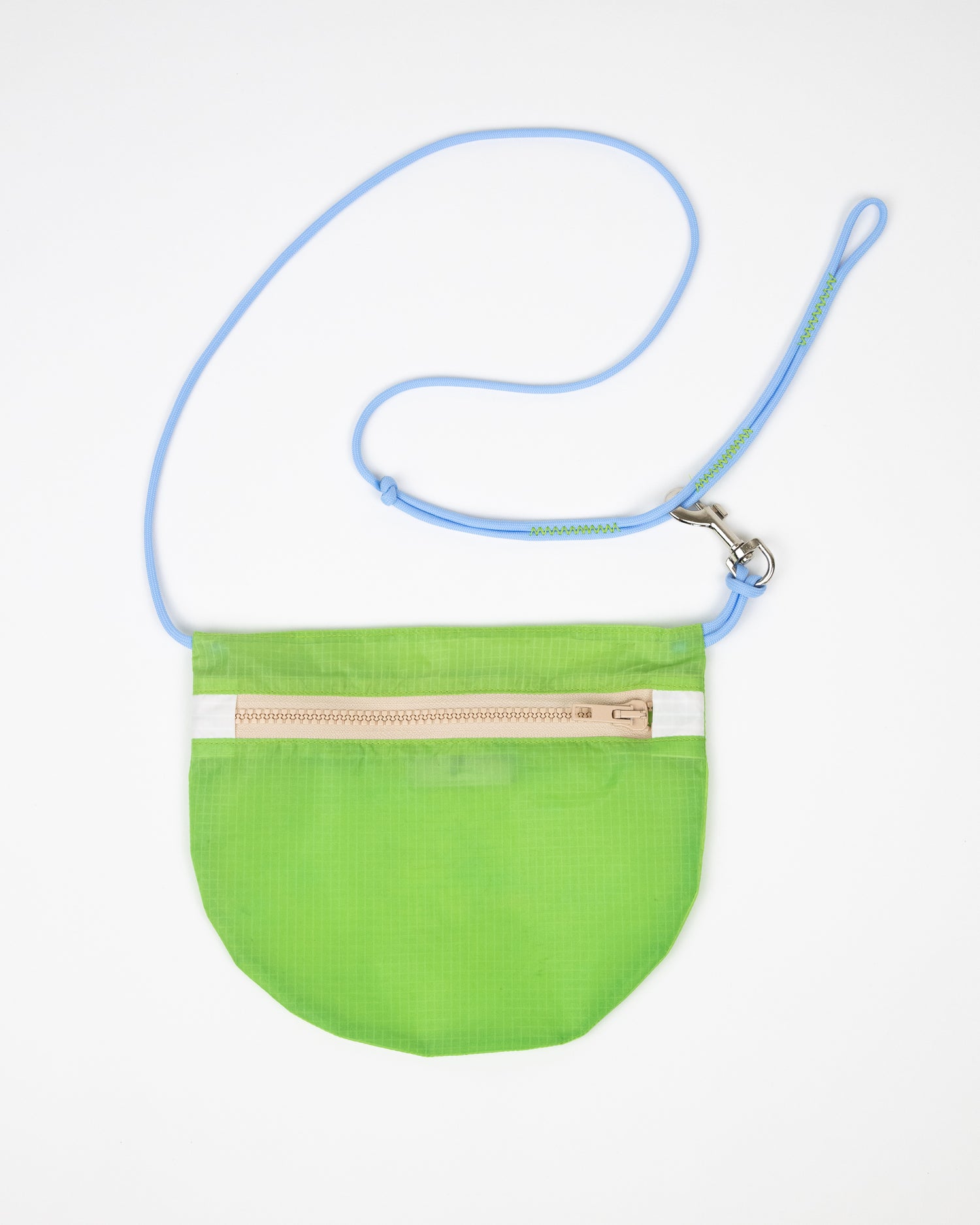 lime green and beige crossbody bag made from vintage paragliders called the U.BAG