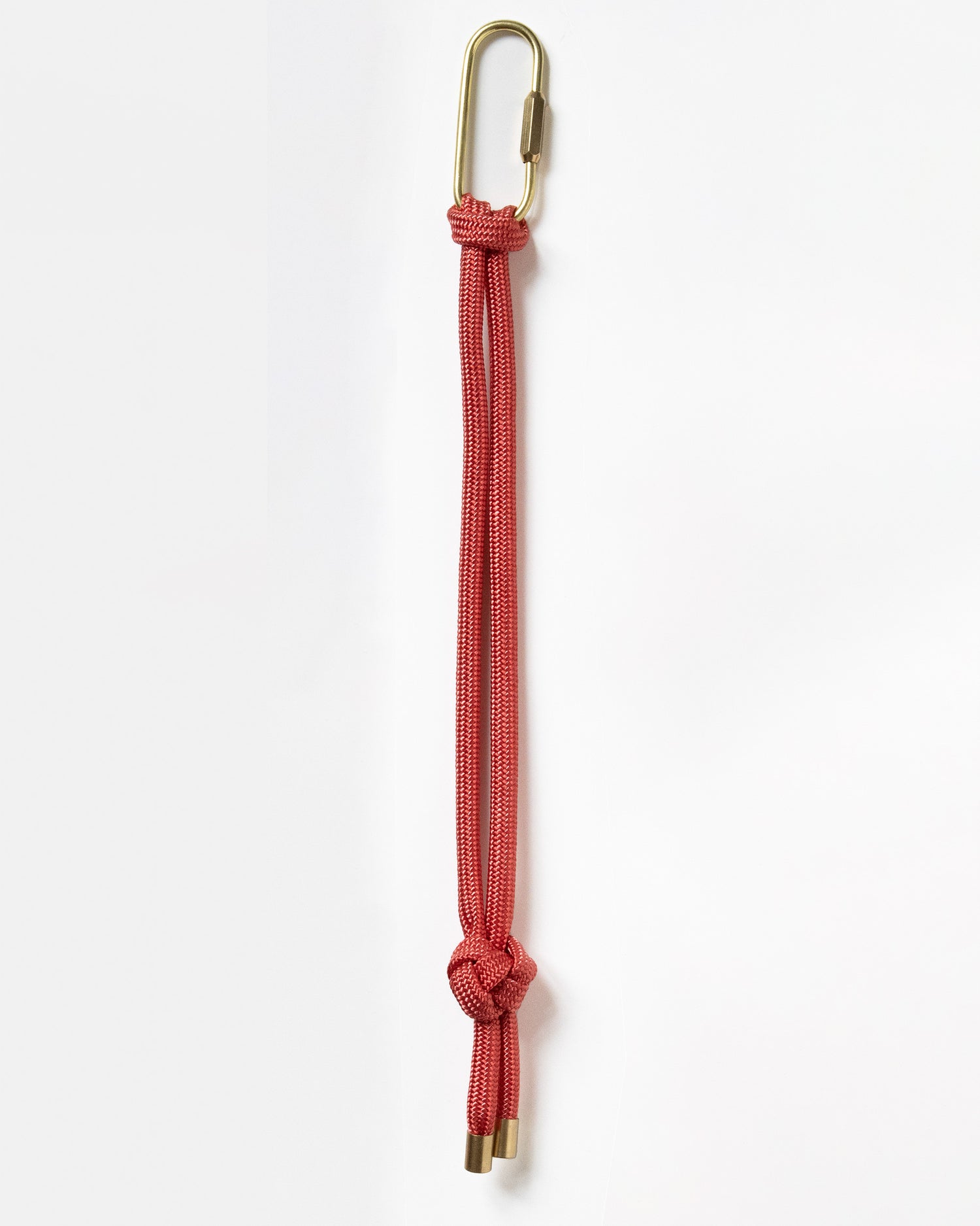 hand knotted recycled rope keychain with brass finishings and carabiner in Zinnia Red