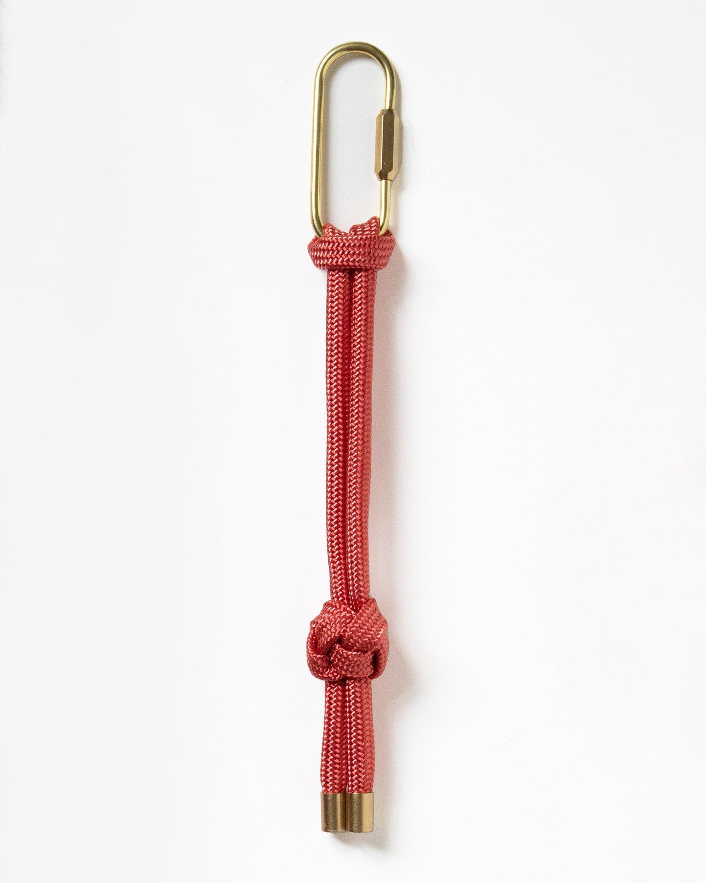 hand knotted recycled rope keychain with brass finishings and carabiner in Zinnia Red