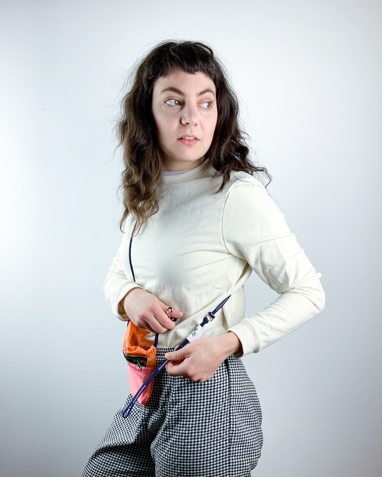 Model showing how to wear the U.BAG strap extension